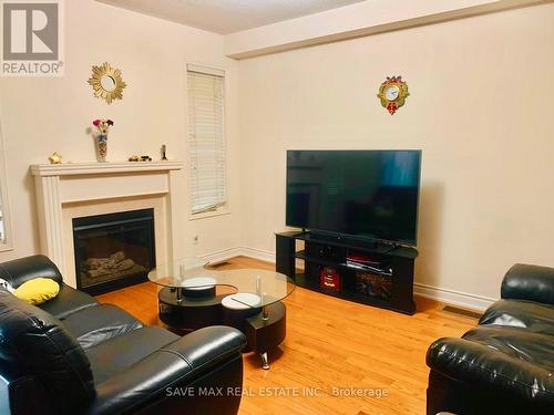 4628 Sandford Farm Drive, Mississauga, ON - Indoor Photo Showing Living Room With Fireplace