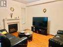 4628 Sandford Farm Drive, Mississauga, ON  - Indoor Photo Showing Living Room With Fireplace 