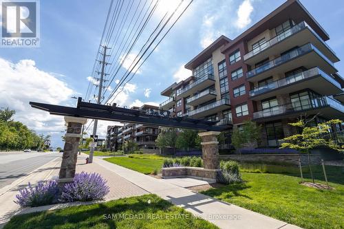 Gr20 - 1575 Lakeshore Road W, Mississauga, ON - Outdoor With Facade