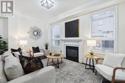 1087 Tupper Drive, Milton, ON - Indoor Photo Showing Living Room With Fireplace