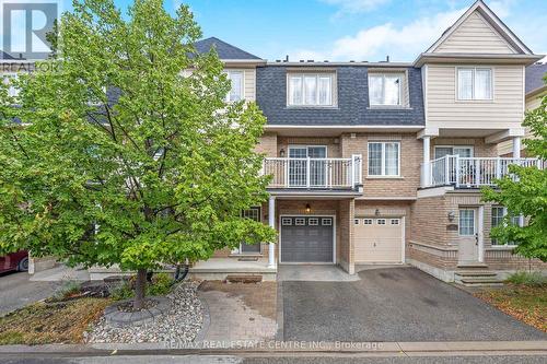 100 - 620 Ferguson Drive, Milton, ON - Outdoor With Balcony With Facade