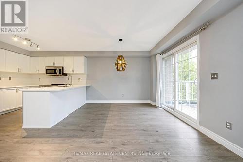 100 - 620 Ferguson Drive, Milton, ON - Indoor Photo Showing Kitchen