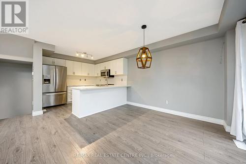 100 - 620 Ferguson Drive, Milton, ON - Indoor Photo Showing Kitchen