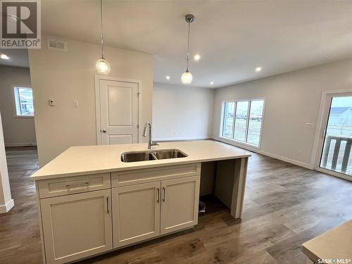 8 Aspen Place, Humboldt, SK - Indoor Photo Showing Kitchen With Double Sink