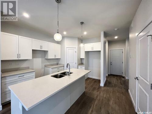 8 Aspen Place, Humboldt, SK - Indoor Photo Showing Kitchen With Double Sink