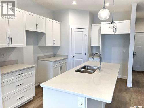 8 Aspen Place, Humboldt, SK - Indoor Photo Showing Kitchen With Double Sink