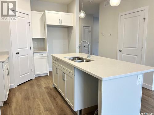 8 Aspen Place, Humboldt, SK - Indoor Photo Showing Kitchen With Double Sink