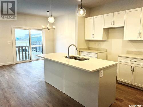 8 Aspen Place, Humboldt, SK - Indoor Photo Showing Kitchen With Double Sink