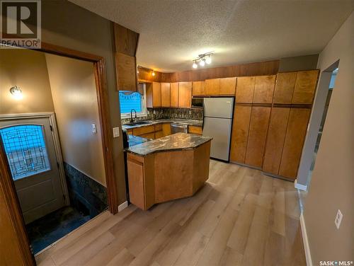 2616 20Th Street W, Saskatoon, SK - Indoor Photo Showing Kitchen With Double Sink