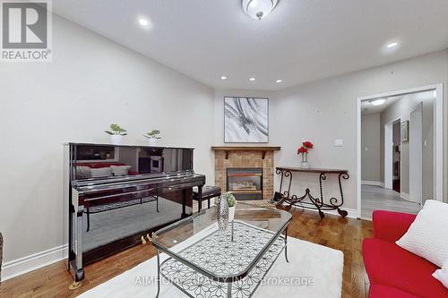 399 Flanagan Court, Newmarket, ON - Indoor Photo Showing Living Room With Fireplace