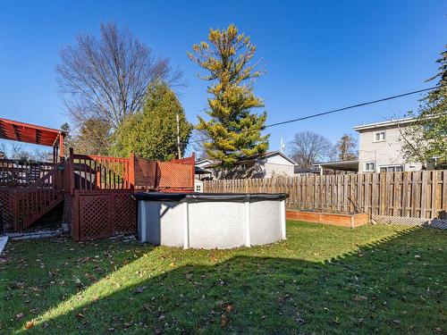 Garden - 5349 Rue Des Maçons, Montréal (Pierrefonds-Roxboro), QC - Outdoor With Above Ground Pool