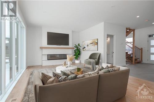 This home is to be built. Photos are of a similar model to showcase builder finishes. - 532 Barrage Street, Casselman, ON - Indoor Photo Showing Living Room With Fireplace