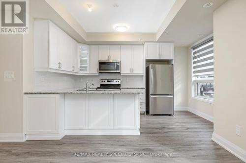 108 - 1569 Rose Way, Milton, ON - Indoor Photo Showing Kitchen With Stainless Steel Kitchen