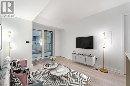 327 - 8 Tippett Road, Toronto, ON - Indoor Photo Showing Living Room