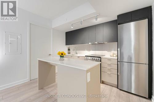 327 - 8 Tippett Road, Toronto, ON - Indoor Photo Showing Kitchen