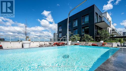 710 - 18 Rouge Valley Drive W, Markham, ON - Outdoor With In Ground Pool