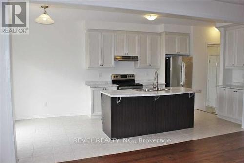 1406 Whitney Terrace, Milton, ON - Indoor Photo Showing Kitchen With Double Sink