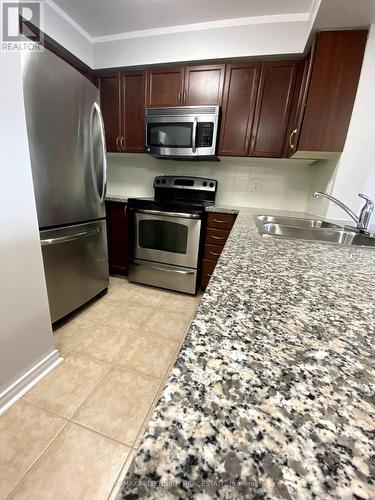 1102 - 4850 Glen Erin Drive, Mississauga, ON - Indoor Photo Showing Kitchen With Stainless Steel Kitchen With Double Sink