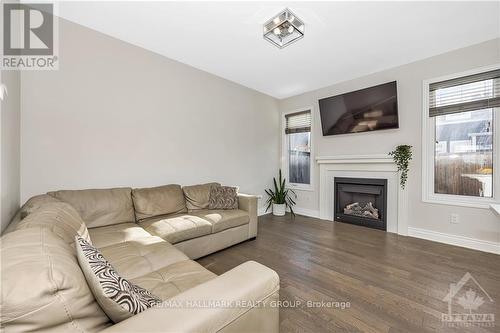 246 Willow Aster Circle, Ottawa, ON - Indoor Photo Showing Living Room With Fireplace