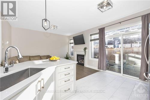 246 Willow Aster Circle, Ottawa, ON - Indoor Photo Showing Kitchen With Fireplace