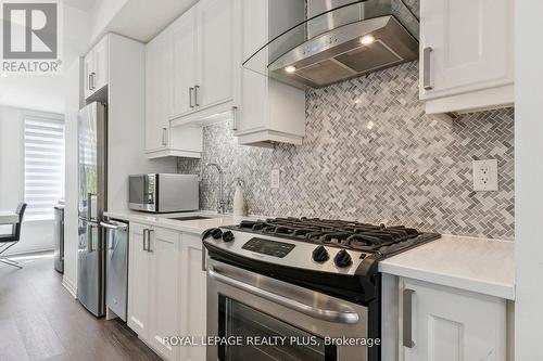 8 - 70 Thomas Mulholland Drive, Toronto, ON - Indoor Photo Showing Kitchen With Stainless Steel Kitchen