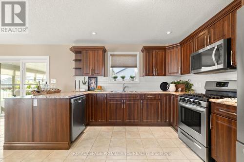 82 Dorchester Drive, Prince Edward County (Wellington), ON - Indoor Photo Showing Kitchen With Stainless Steel Kitchen With Double Sink