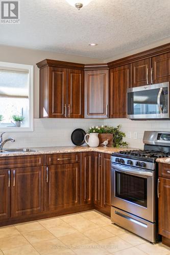 82 Dorchester Drive, Prince Edward County (Wellington), ON - Indoor Photo Showing Kitchen With Stainless Steel Kitchen