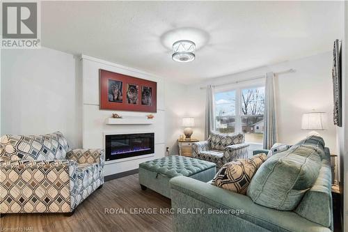 83 Gordon Avenue, Fort Erie, ON - Indoor Photo Showing Living Room With Fireplace