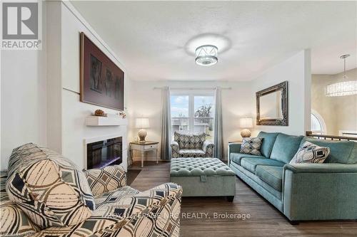 83 Gordon Avenue, Fort Erie, ON - Indoor Photo Showing Living Room With Fireplace