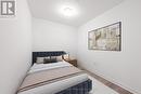 721 - 395 Dundas Street W, Oakville, ON  - Indoor Photo Showing Bedroom 