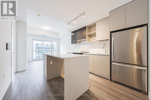 721 - 395 Dundas Street W, Oakville, ON - Indoor Photo Showing Kitchen With Stainless Steel Kitchen