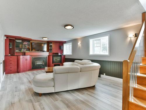 Family room - 2941 Ch. St-Henri, Mascouche, QC - Indoor Photo Showing Living Room With Fireplace