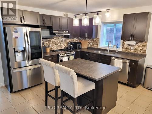 153 Winders Trail, Ingersoll, ON - Indoor Photo Showing Kitchen With Double Sink