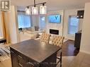 153 Winders Trail, Ingersoll, ON  - Indoor Photo Showing Dining Room With Fireplace 