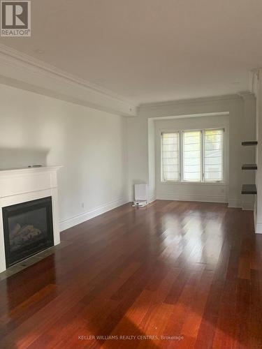 163 Silver Birch Avenue, Toronto, ON - Indoor Photo Showing Living Room With Fireplace