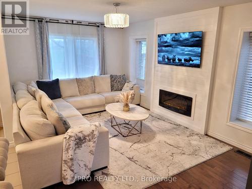 153 Winders Trail, Ingersoll, ON - Indoor Photo Showing Living Room With Fireplace