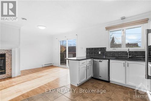 816 Charles Emile Street, Hawkesbury, ON - Indoor Photo Showing Kitchen With Fireplace