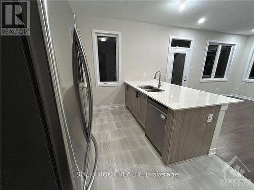 513 Marcato Lane, Ottawa, ON - Indoor Photo Showing Kitchen With Double Sink