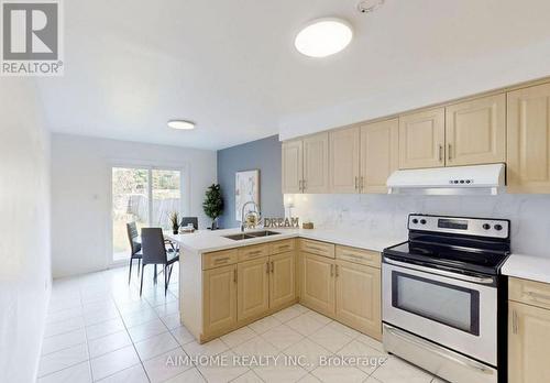 125 Roxanne Crescent, Toronto, ON - Indoor Photo Showing Kitchen With Double Sink