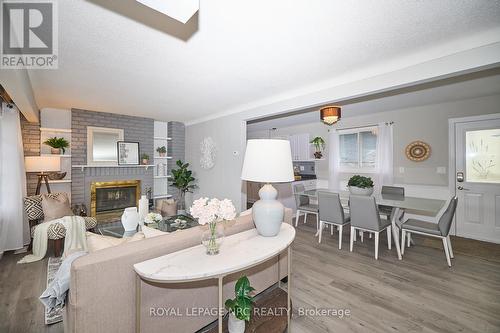 7405 Susan Crescent, Niagara Falls (220 - Oldfield), ON - Indoor Photo Showing Dining Room With Fireplace