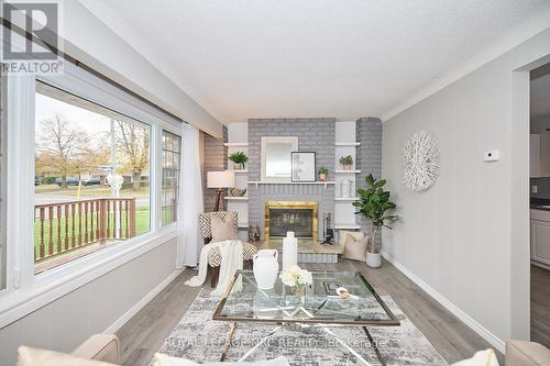 7405 Susan Crescent, Niagara Falls (220 - Oldfield), ON - Indoor Photo Showing Other Room With Fireplace