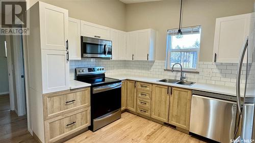 229 Milden Street, Conquest, SK - Indoor Photo Showing Kitchen With Double Sink With Upgraded Kitchen