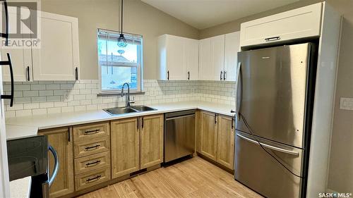 229 Milden Street, Conquest, SK - Indoor Photo Showing Kitchen With Double Sink