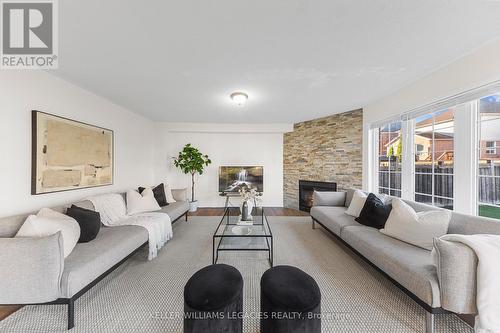 699 Mccue Drive, Oshawa, ON - Indoor Photo Showing Living Room With Fireplace