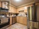 303 - 64 Sidney Belsey Crescent, Toronto, ON  - Indoor Photo Showing Kitchen 