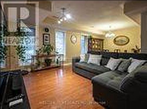 303 - 64 Sidney Belsey Crescent, Toronto, ON - Indoor Photo Showing Living Room