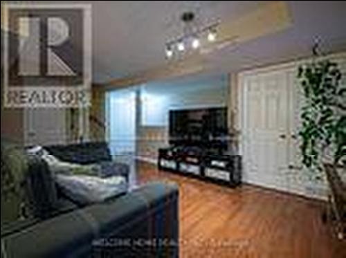 303 - 64 Sidney Belsey Crescent, Toronto, ON - Indoor Photo Showing Living Room