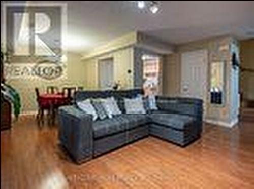 303 - 64 Sidney Belsey Crescent, Toronto, ON - Indoor Photo Showing Living Room