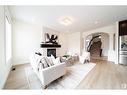 2615 Blue Jay Cl Nw, Edmonton, AB  - Indoor Photo Showing Living Room With Fireplace 