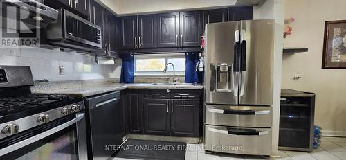 106 - 250 John Garland Boulevard, Toronto, ON - Indoor Photo Showing Kitchen